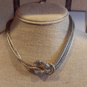 Gold and silver large knot choke.